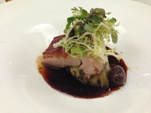 Suckling pig with aubergine, kalamata olives and lime 